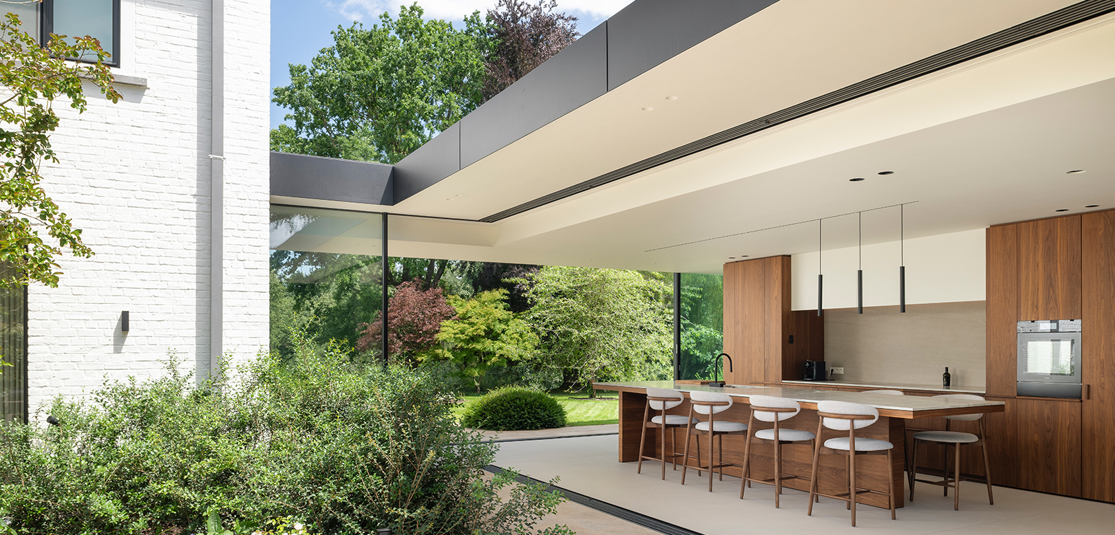 Functioneel hertekenen en esthetisch verenigen van woning in Bierbeek door Studio Stiels
